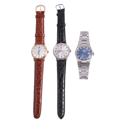 Lot 1180 - Tissot - a 9ct gold cased wristwatch and two other Tissot watches