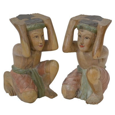 Lot 153 - Two carved and painted figural table pillars