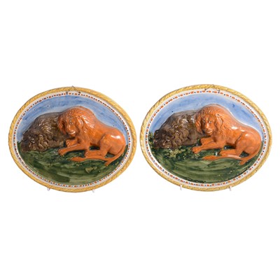 Lot 47 - Pair of Prattware relief moulded pottery lion plaques