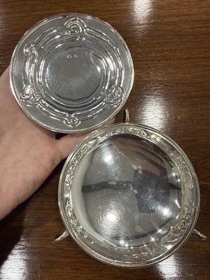 Lot 135 - Archibald Knox for Liberty & Co., a Cymric silver muffin dish and cover, 1902