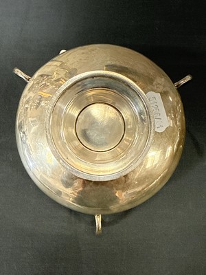 Lot 135 - Archibald Knox for Liberty & Co., a Cymric silver muffin dish and cover, 1902