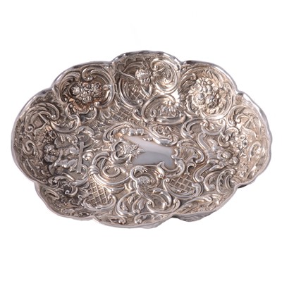 Lot 202 - Victorian silver repousse chased dish, William Comyns & Sons, London 1892.