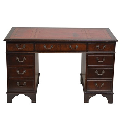 Lot 380 - Reproduction mahogany desk, red leather inset