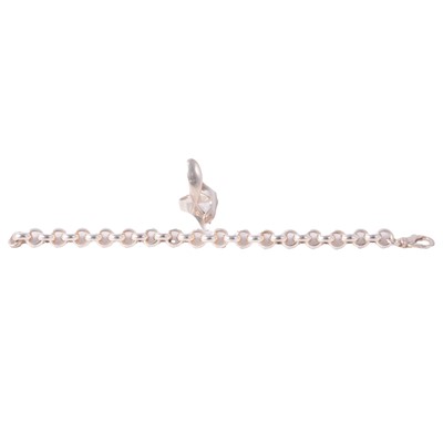 Lot 420 - A white metal bracelet marked 925 and ring.