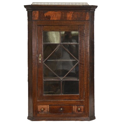 Lot 438 - Georgian oak and mahogany hanging corner cabinet