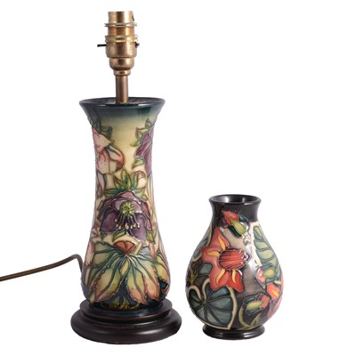 Lot 13 - A Moorcroft table lamp and vase.