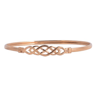 Lot 214 - A child's 9 carat yellow gold hinge top bangle.