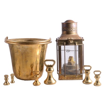Lot 125 - A brass bucket, six brass imperial weights, brass hand held oil lamp.