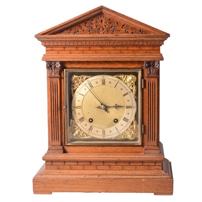 Lot 144 - Late Victorian oak mantel clock