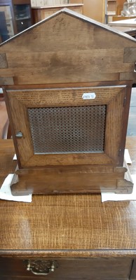 Lot 117 - Late Victorian oak mantel clock