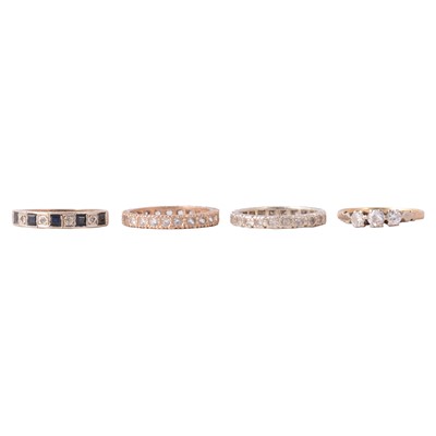 Lot 111 - Four gemset rings, diamond, sapphire and diamond, synthetic white stone (not diamond).