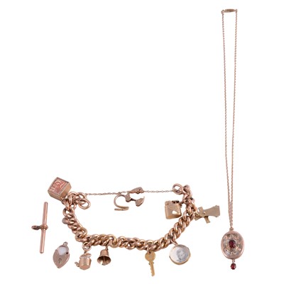 Lot 183 - A rose metal charm bracelet, seven charms, T bar, padlock, and an Edwardian pendant and chain.