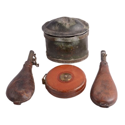 Lot 94 - A lead tobacco box with damper, two shot flasks, a John Rabone surveyors tape.