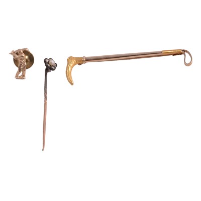 Lot 352 - A yellow metal riding crop brooch, cultured pearl and diamond tie pin, and tie tac.