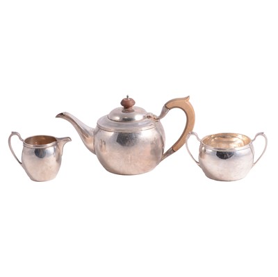 Lot 313 - Silver three-piece bachelor's teaset, maker's mark rubbed, Birmingham 1921.