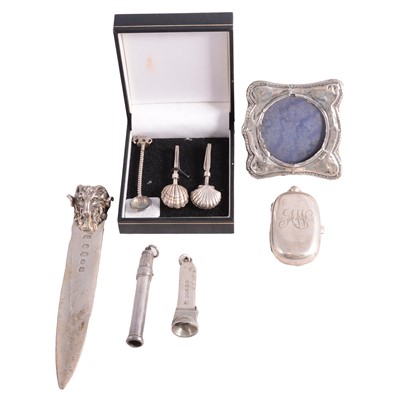 Lot 322 - Silver paper knife, two personal napkin holders, double sovereign case, cigar cutter, etc.