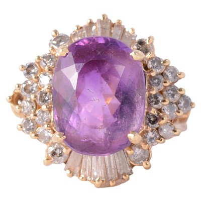 Lot 2 - An amethyst and diamond cluster cocktail ring.