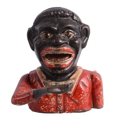Lot 85 - Cast iron jolly black man money bank