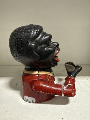 Lot 85 - Cast iron “Jolly” money bank