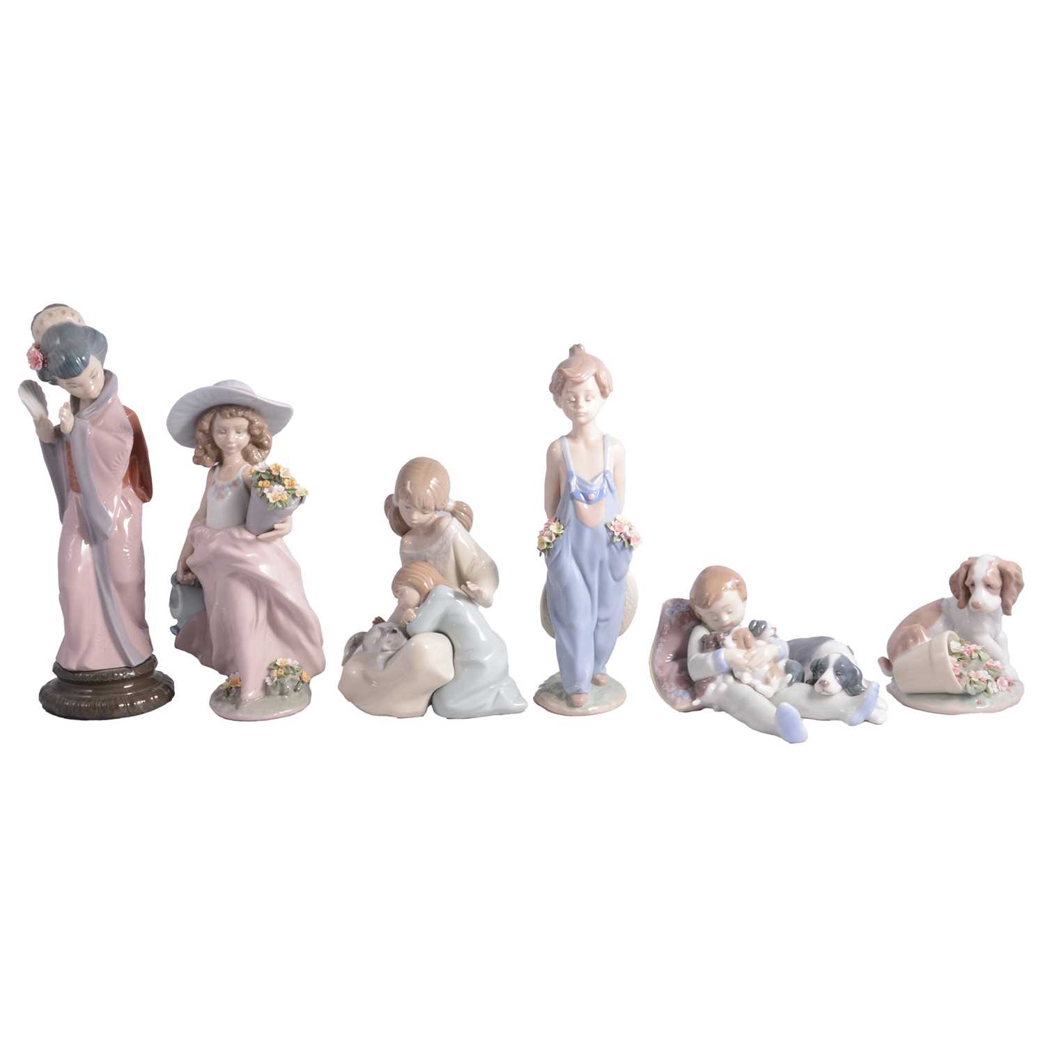 Lot 31 - Nine Lladro porcelain figures and one Nao figure