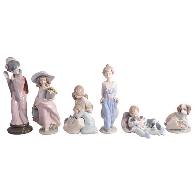 Lot 31 - Nine Lladro porcelain figures and one Nao figure