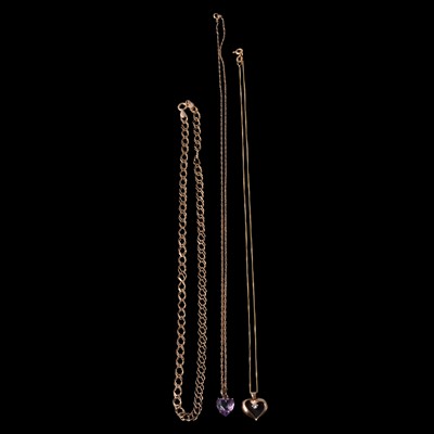 Lot 155 - Two gemset pendants, and three yellow metal chains.