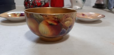 Lot 29 - Set of six Royal Worcester fruit painted coffee cans and saucers, and a sugar bowl