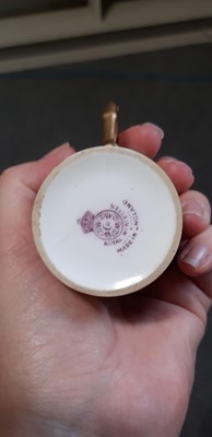 Lot 29 - Set of six Royal Worcester fruit painted coffee cans and saucers, and a sugar bowl