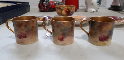 Lot 29 - Set of six Royal Worcester fruit painted coffee cans and saucers, and a sugar bowl
