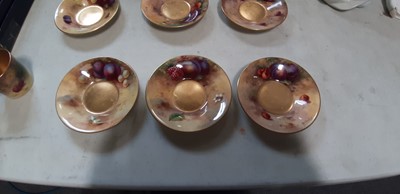 Lot 29 - Set of six Royal Worcester fruit painted coffee cans and saucers, and a sugar bowl