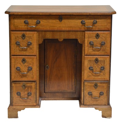 Lot 447 - George I style walnut kneehole desk