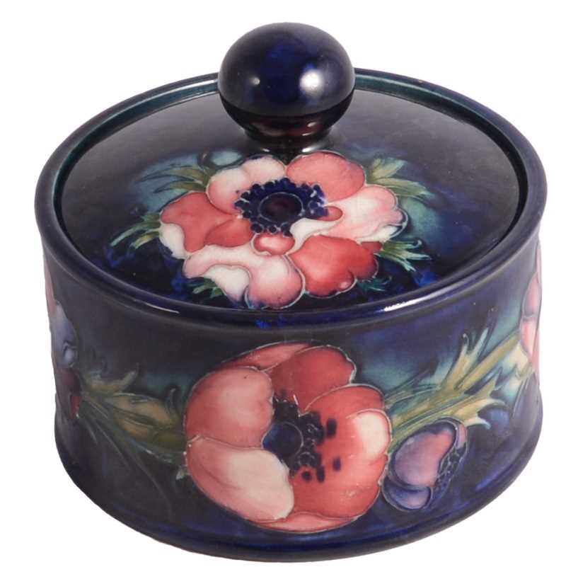Lot 18 - Moorcroft Pottery, an 'Anemone' pattern box and cover