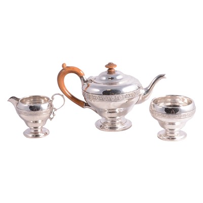 Lot 304 - Silver three-piece bachelor's teaset, Charles & Richard Comyns, London 1922.