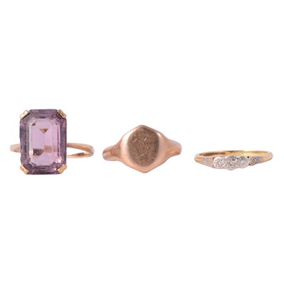 Lot 4 - Three rings, purple paste, signet, three stone illusion set.