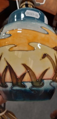 Lot 24 - Moorcroft Pottery, a 'Reeds at Sunset' pattern table lamp