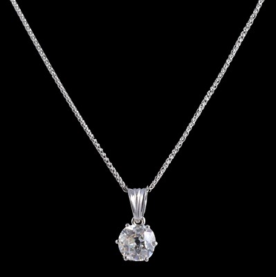 Lot 252 - A diamond solitaire pendant and chain.