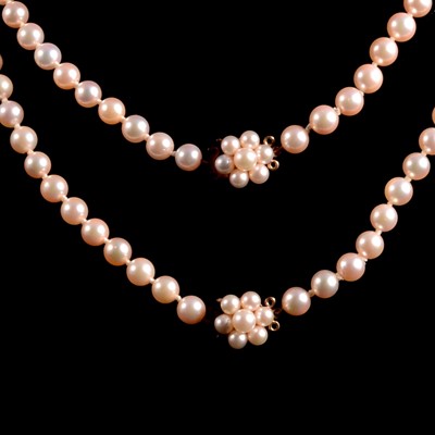 Lot 311 - Two cultured pearl necklaces that may be worn as one longer rope necklace.