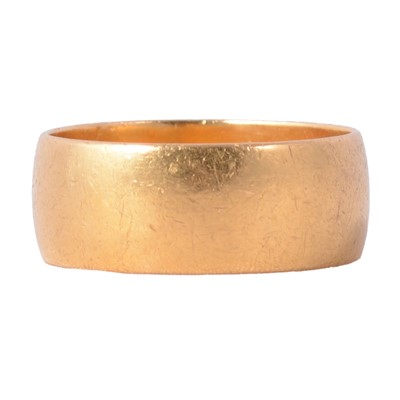 Lot 138 - A 22 carat yellow gold wedding band.