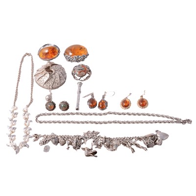 Lot 431 - An amber ring, brooch, earrings, moss agate brooch and earrings, filligree purse, charm bracelet, toothpick.
