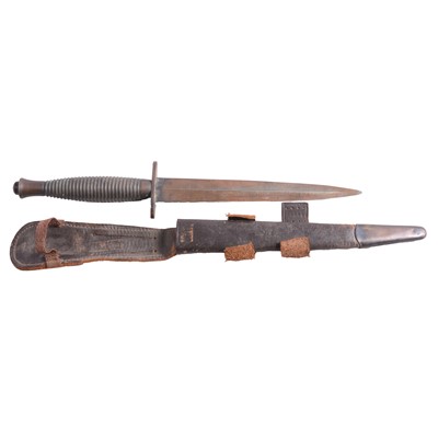 Lot 154 - WWII Fairburn Sykes commando knife, with leather sheath
