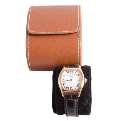 Lot 1004 - Cartier - a Tortue 18 carat yellow gold manual wind wristwatch.