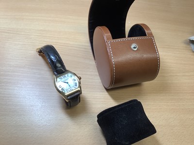 Lot 1004 - Cartier - a Tortue 18 carat yellow gold manual wind wristwatch.