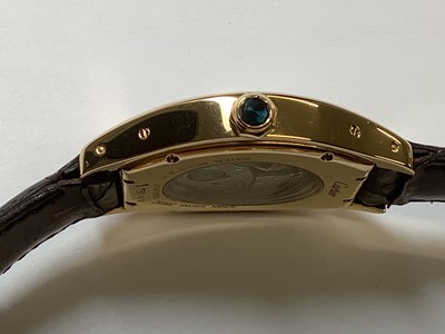 Lot 1004 - Cartier - a Tortue 18 carat yellow gold manual wind wristwatch.