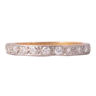Lot 106 - A diamond half eternity ring.