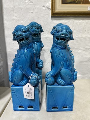 Lot 18 - Four pairs of Chinese pottery Foo dogs