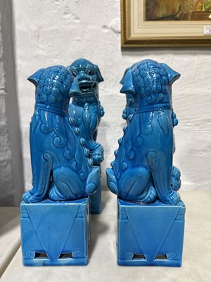 Lot 18 - Four pairs of Chinese pottery Foo dogs