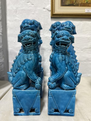 Lot 18 - Four pairs of Chinese pottery Foo dogs