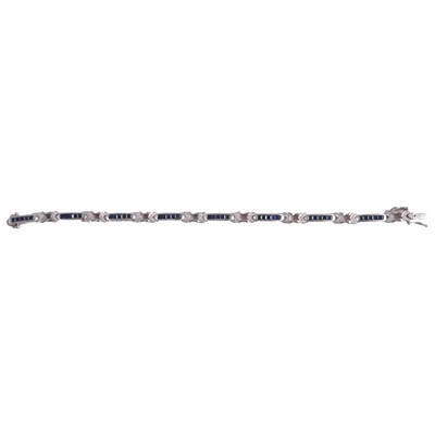 Lot 206 - A sapphire and diamond bracelet.