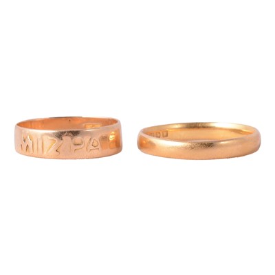 Lot 139 - A 22 carat gold wedding band, and a Victorian 18 carat yellow gold Mizpah ring.