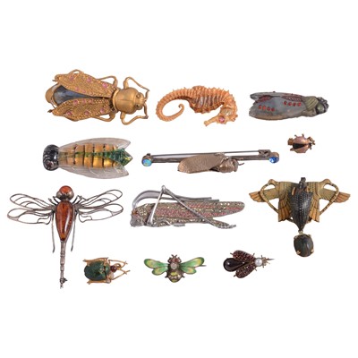 Lot 517 - Twelve white metal, gilt metal, and natural bug and animal brooches, some gemset.